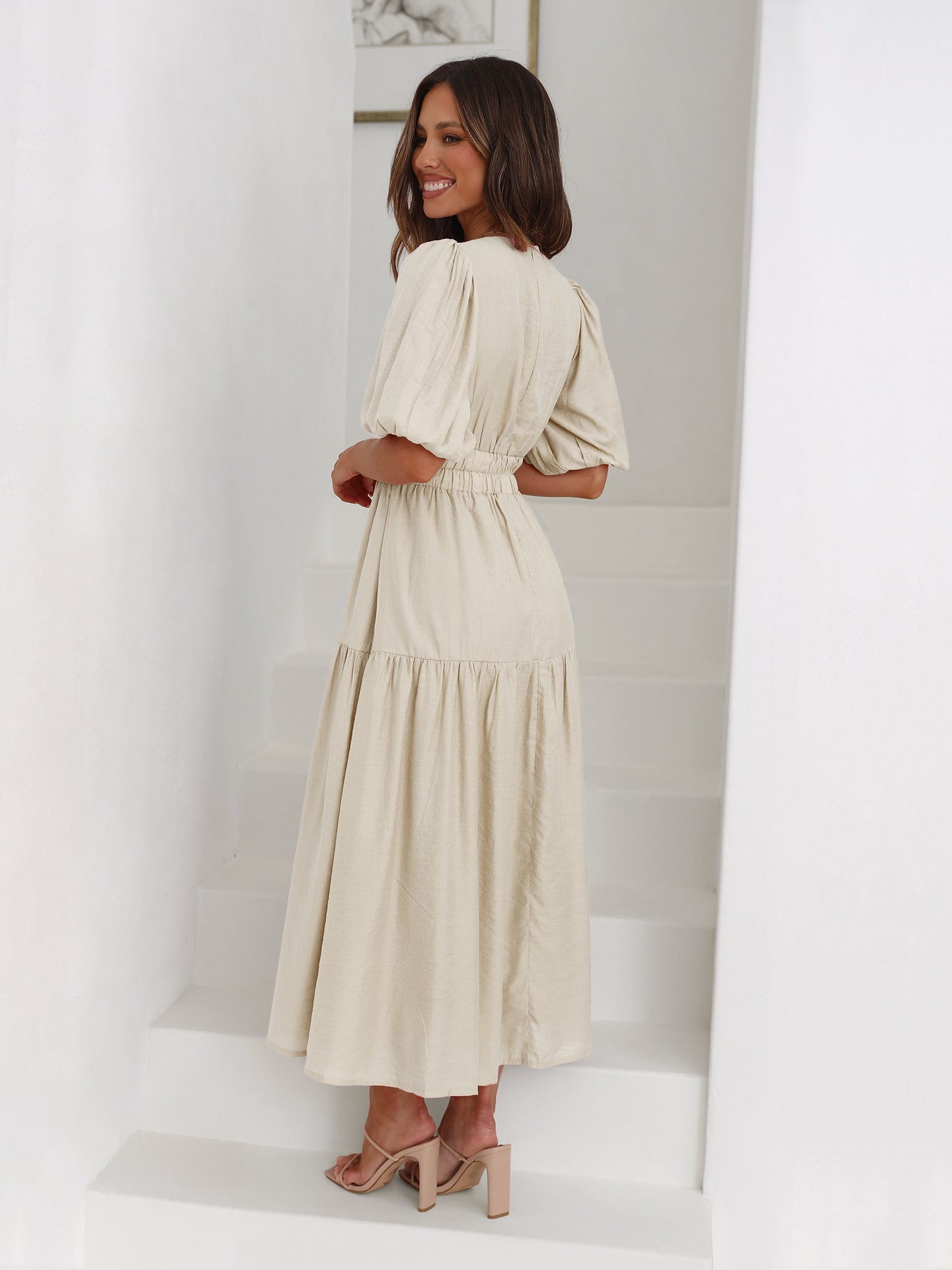 Elegant midi-dress with puff sleeves for women
