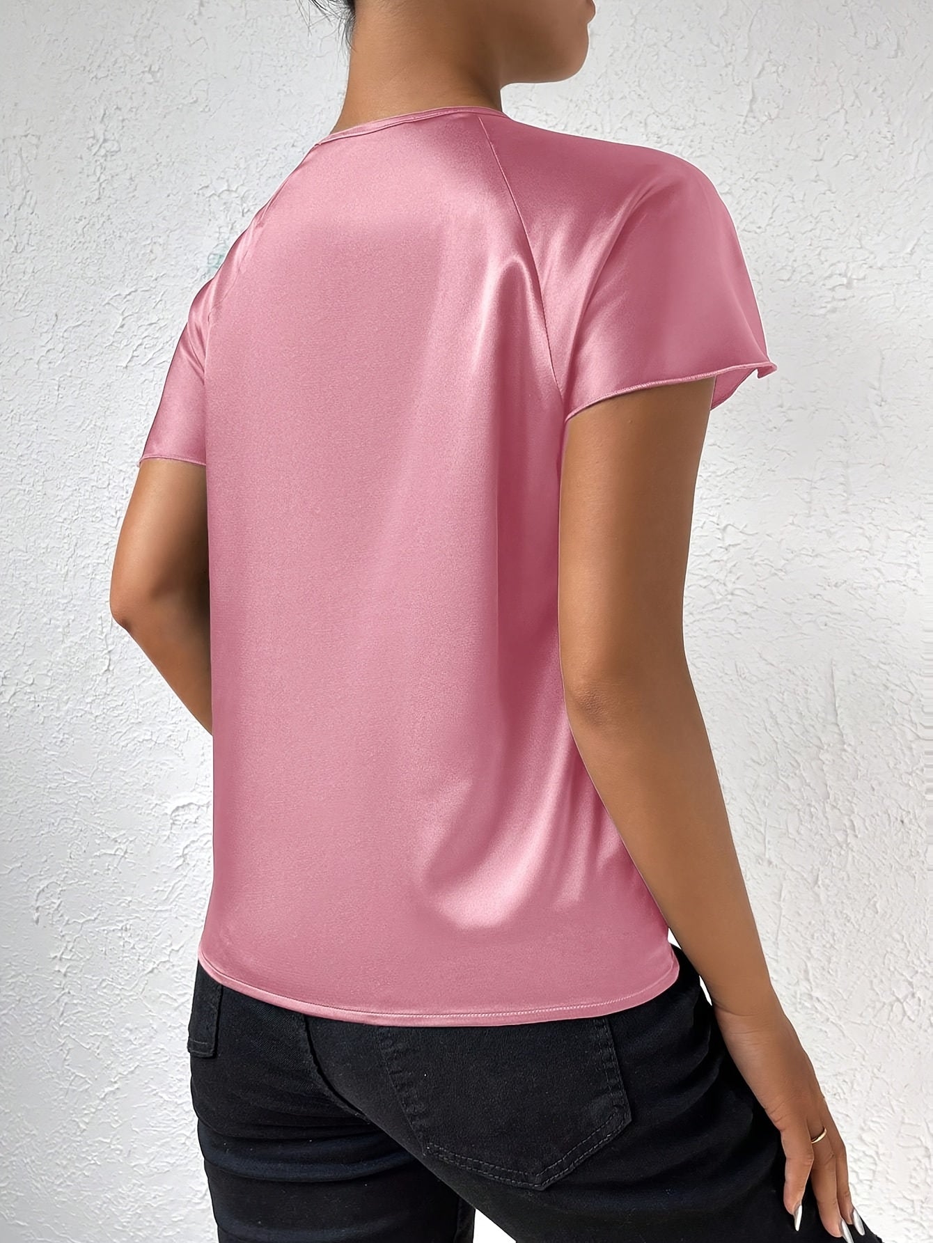 Modern top with eye-catching shoulders for women