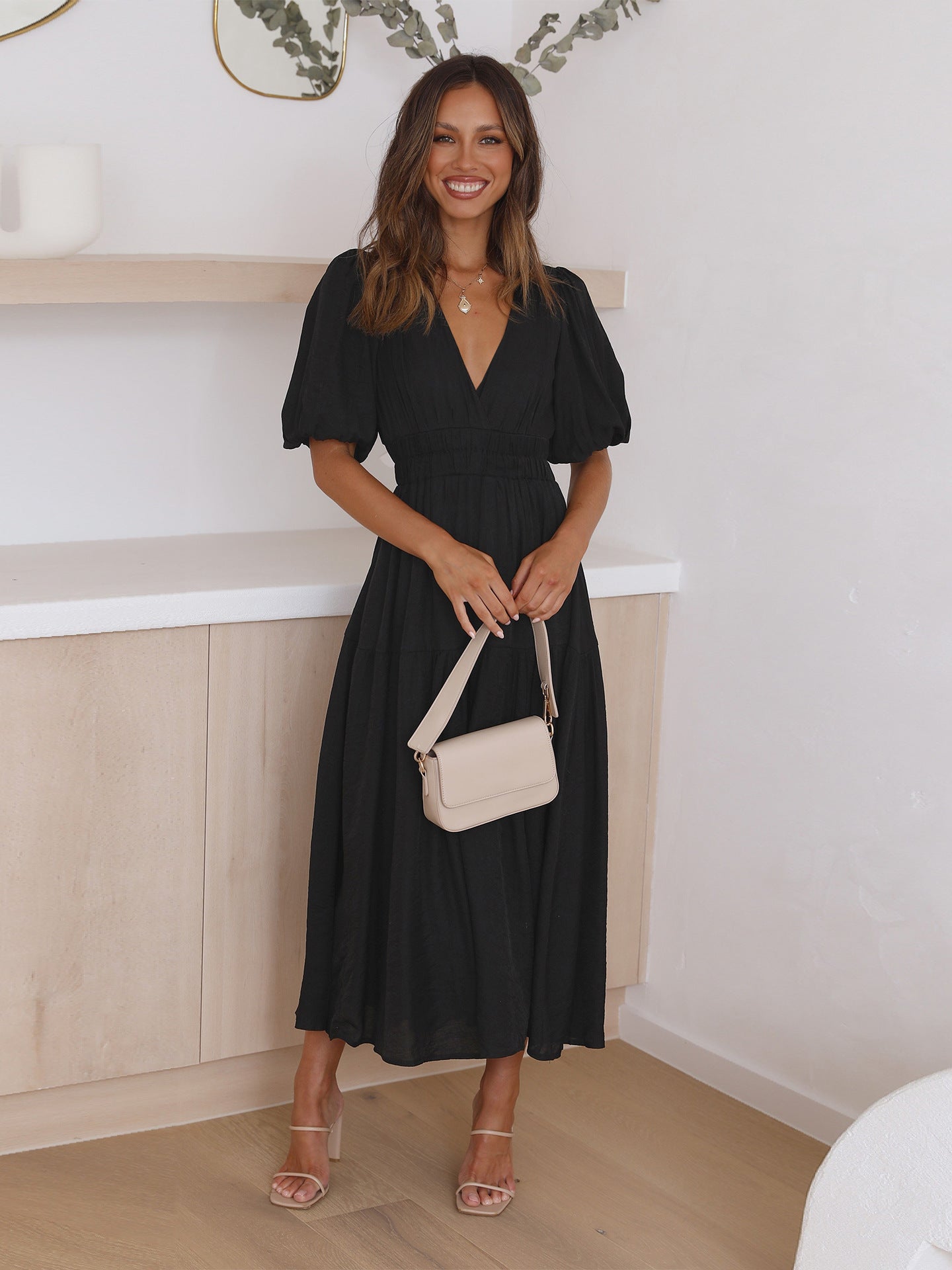 Elegant midi-dress with puff sleeves for women