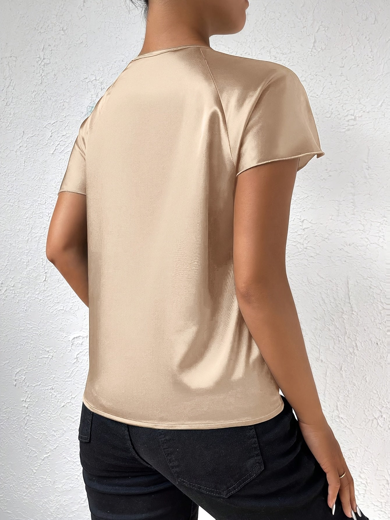 Modern top with eye-catching shoulders for women