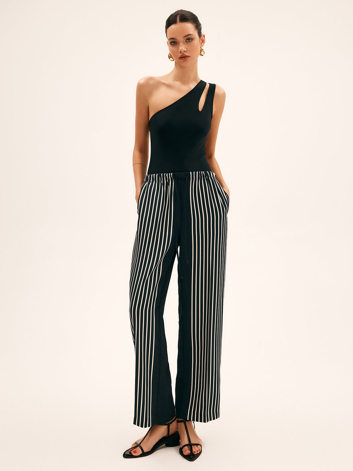 Asymmetrically cut swimsuit for women