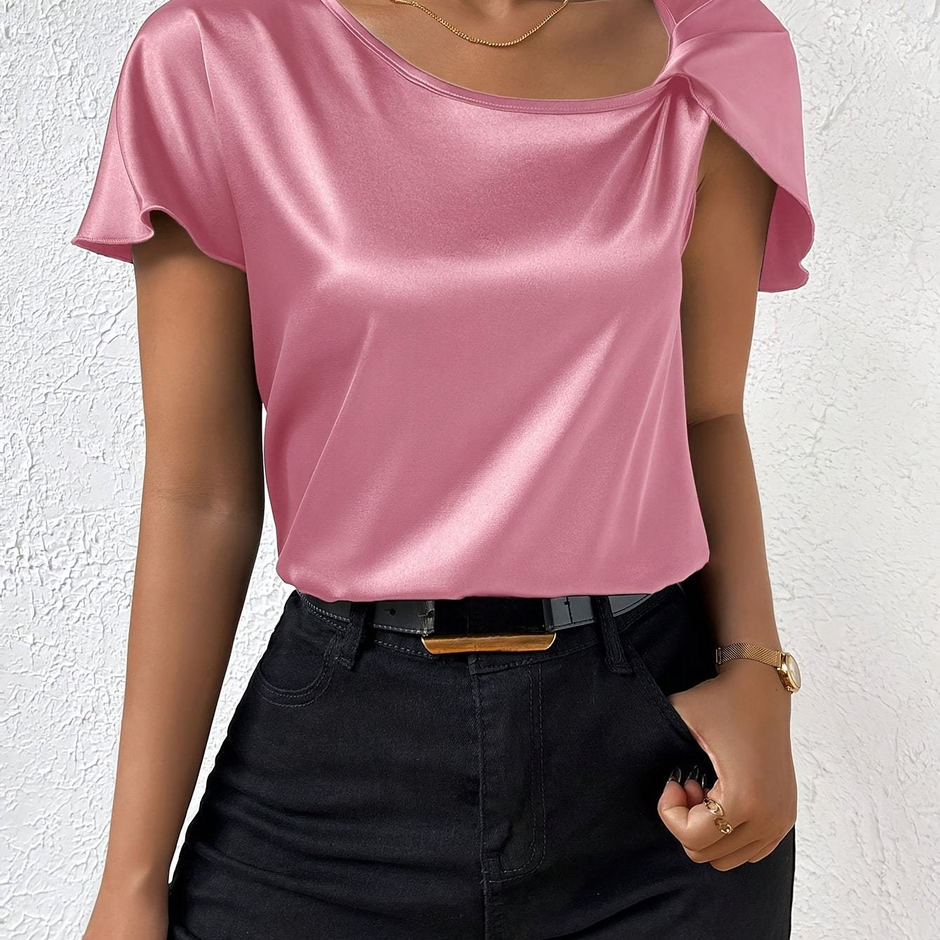 Modern top with eye-catching shoulders for women