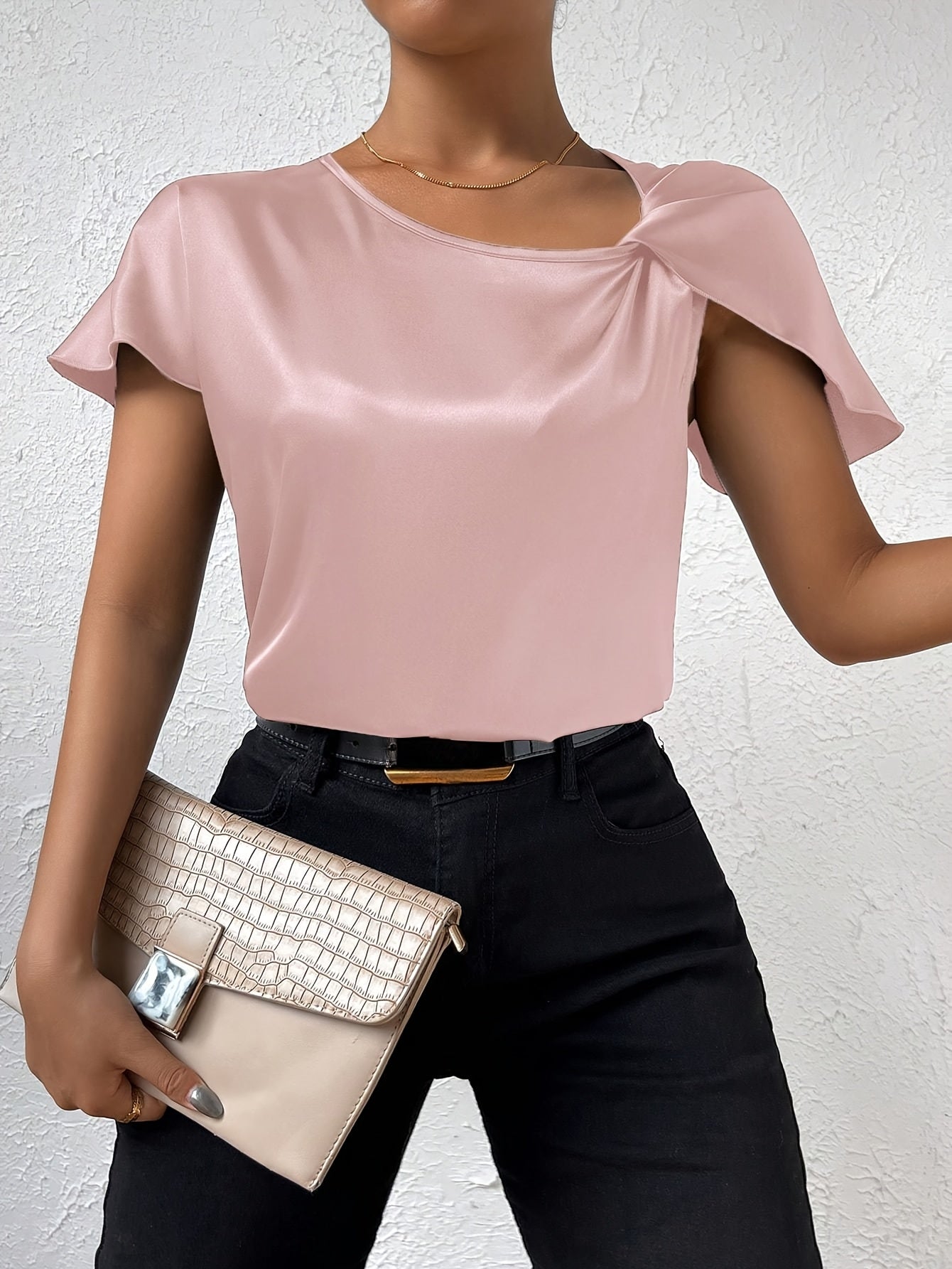 Moderne top met opvallende schouders voor dames