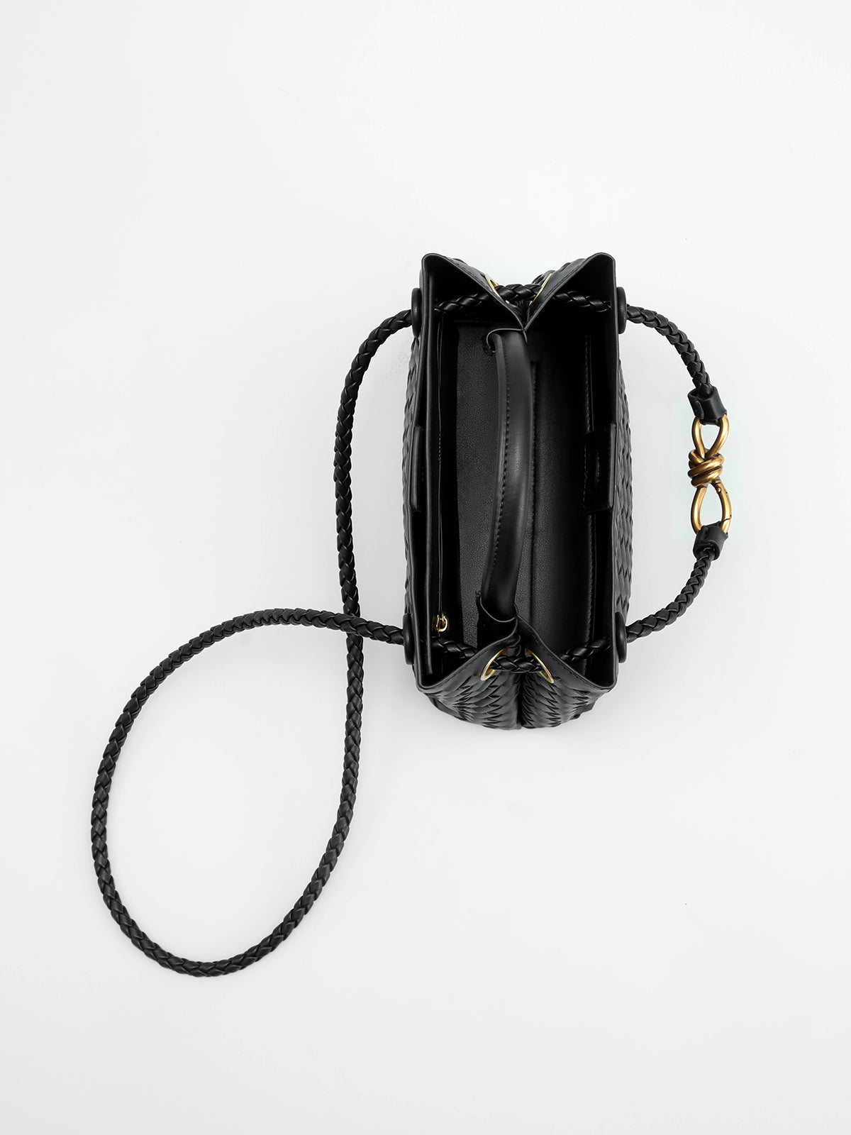 Tas met Metaal Twist Detail en Elegant Handvat