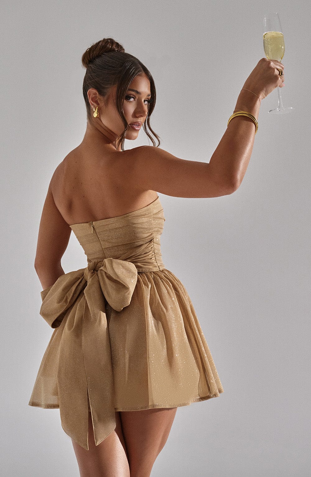 Sprankelende Strapless Glinsterende Jurk met strik op de rug