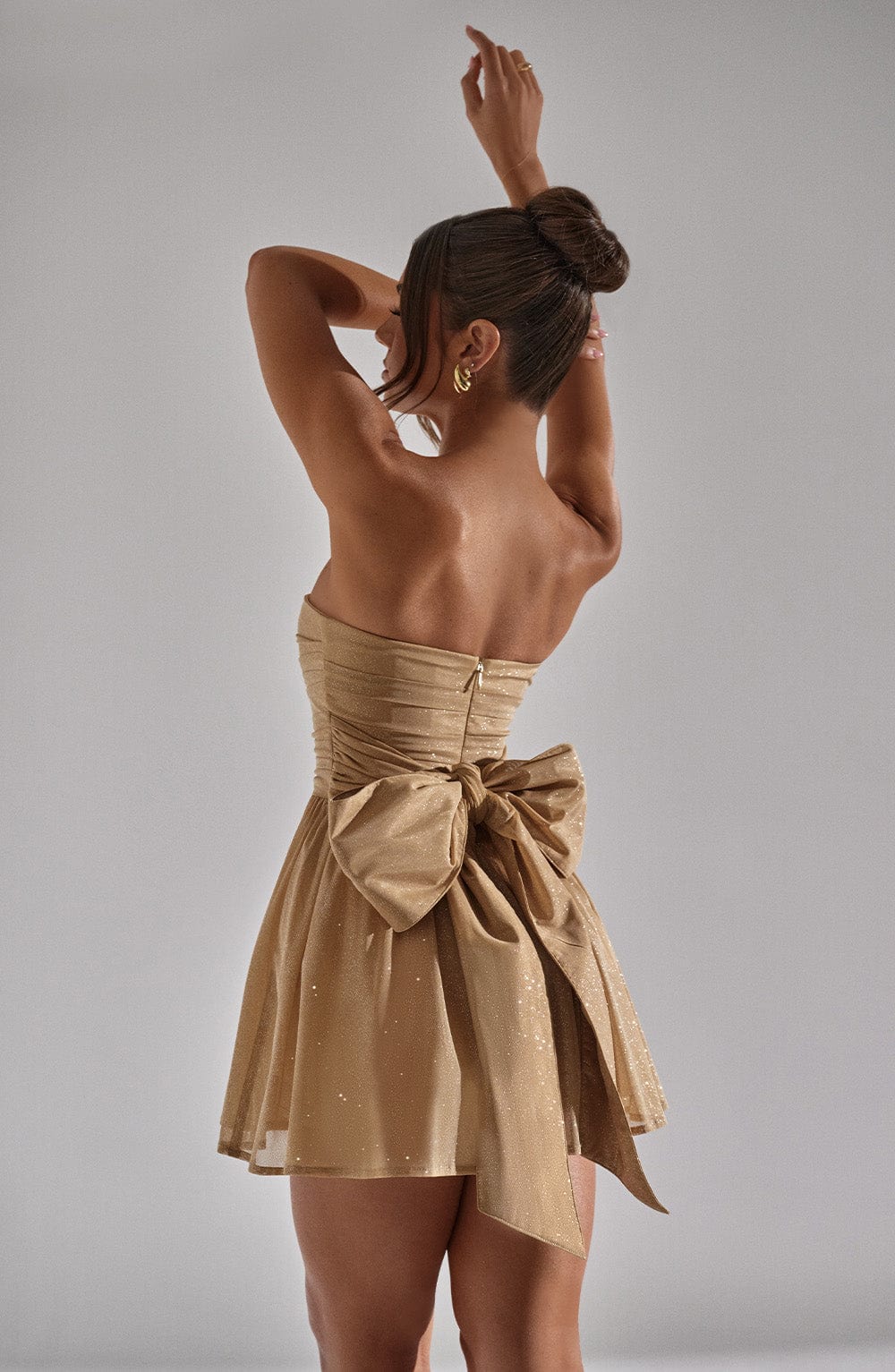 Sprankelende Strapless Glinsterende Jurk met strik op de rug