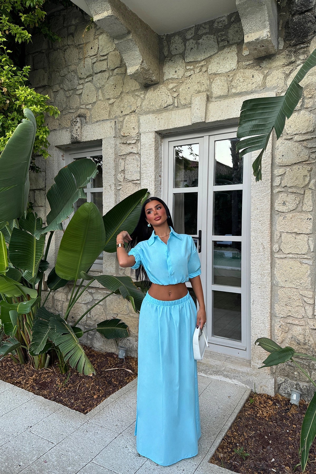 Turquoise Neolda Set met Stijlvolle Pasvorm